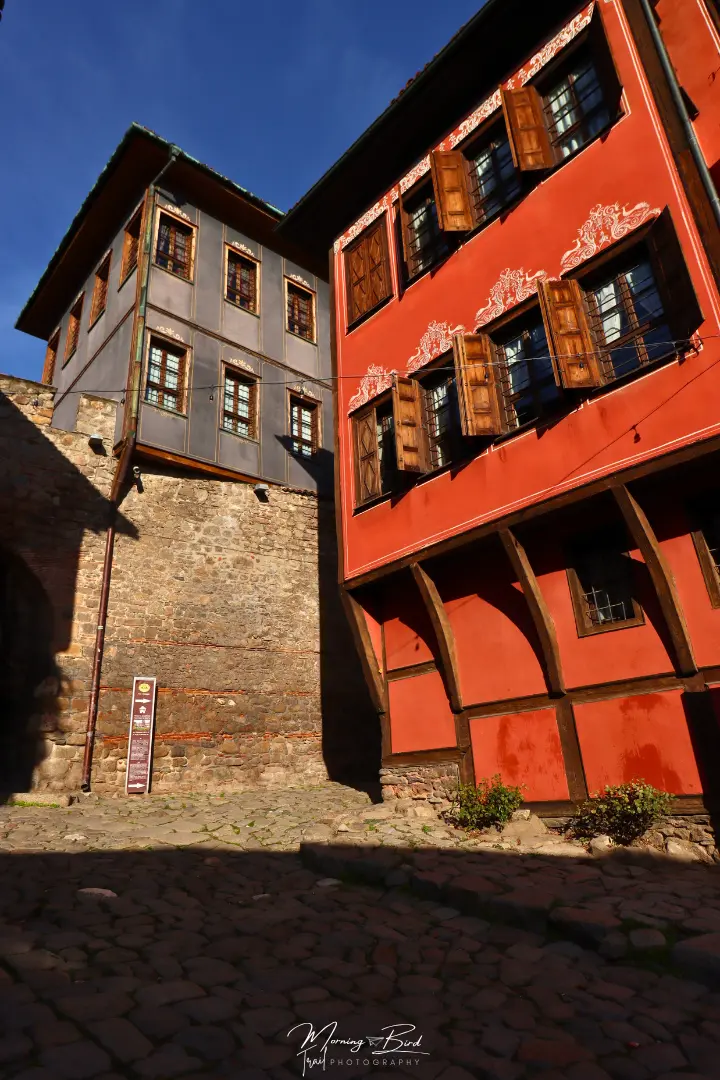 Plovdiv colourful traditional bulgarian houses in cobblestone streets - blue and orange