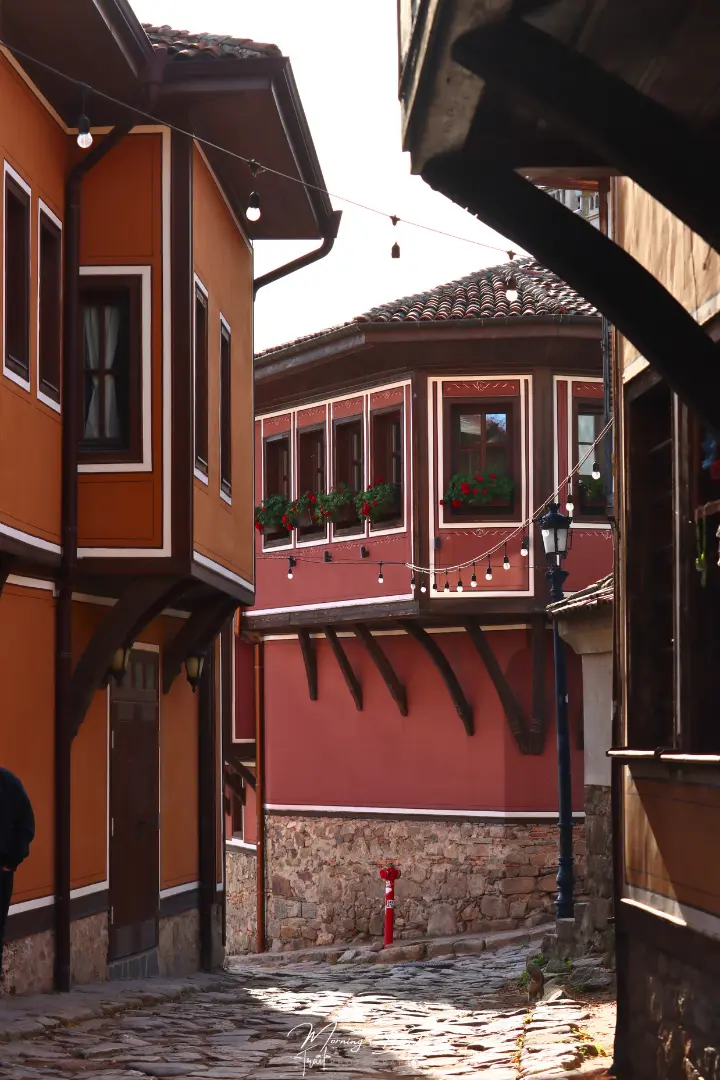 Plovdiv colourful traditional bulgarian houses in cobblestone streets - pink and orange