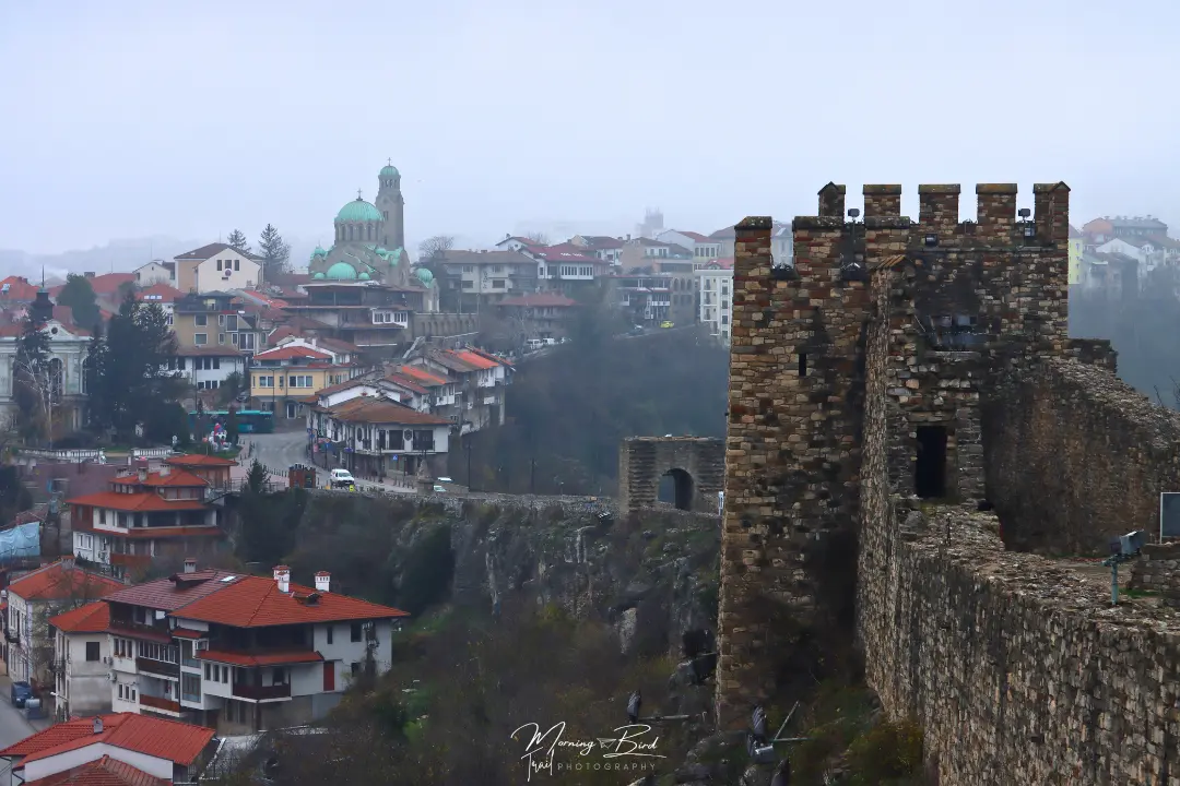 View from Tsarevets Fortress in Veliko Tarnovo, Bulgaria, framed by the fortress wall