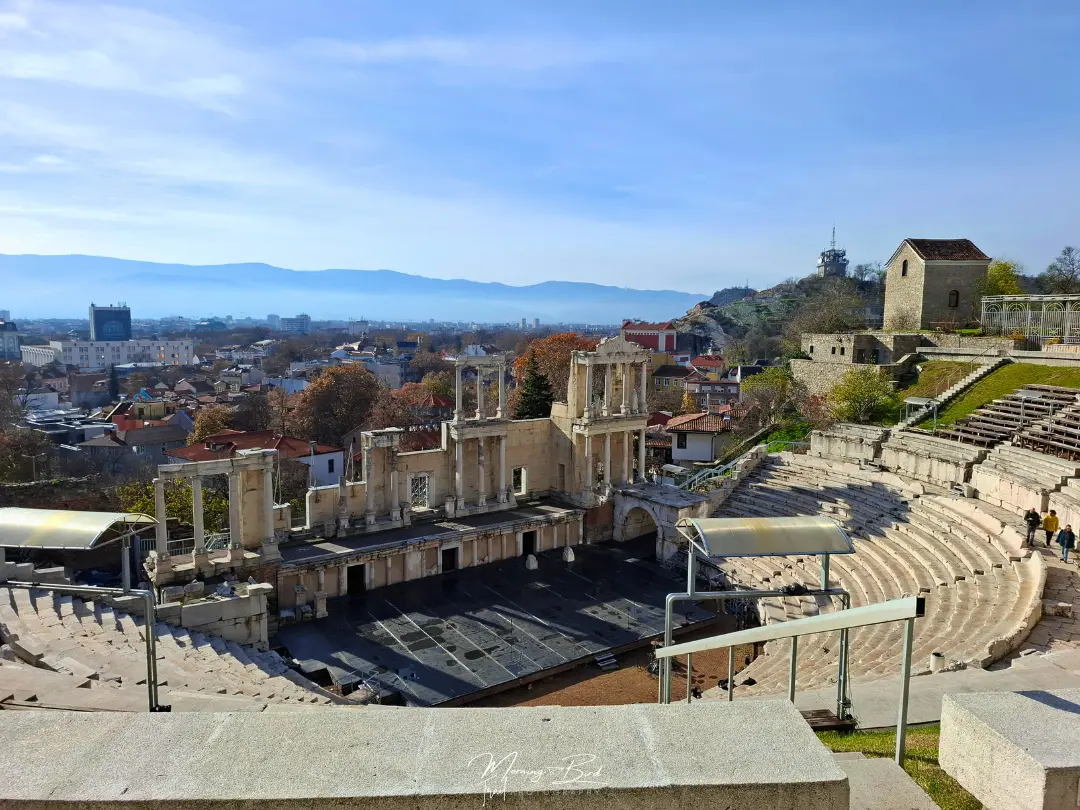 Plovdiv theater with the mountain and the city in the background with blue skies