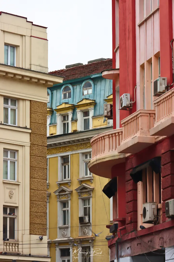Beautiful beige, blue, yellow and red buildings in the streets of Sofia, Bulgaria